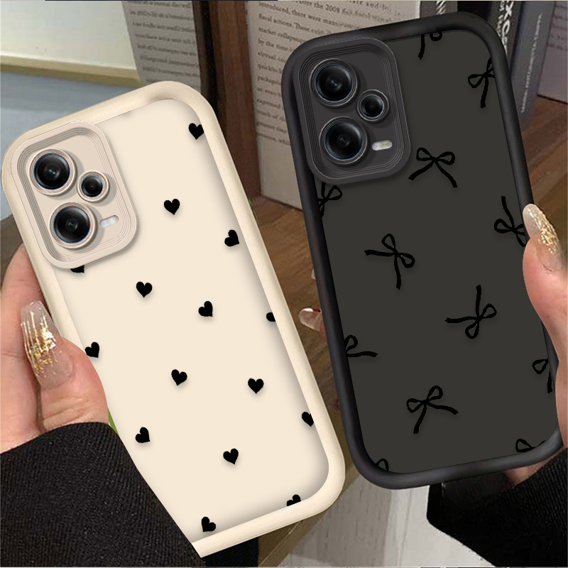 جراب هاتف أسود بتصميم قلب الحب - مراجعة Xiaomi Redmi Note 14 وسعره